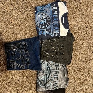 Mens lot of size medium short sleeve American Fighter shirts.  Price is for 4